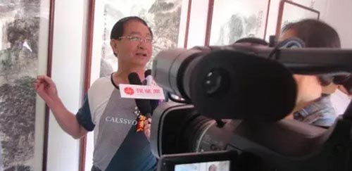 参展艺术家秦保家接受媒体专访.jpg